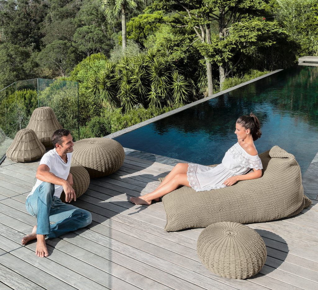 couple on outdoor-poufs